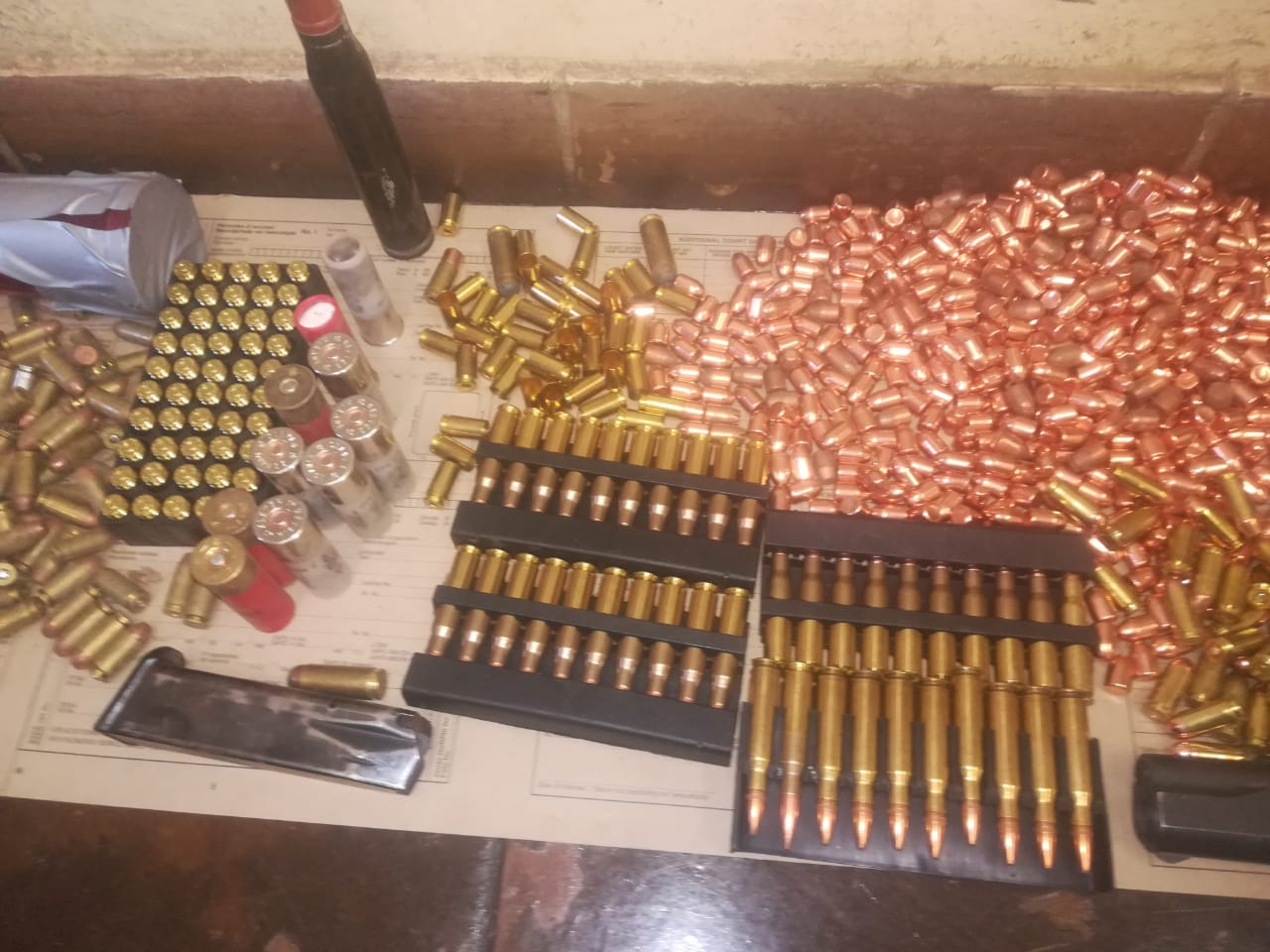 Suspects in court for possession of unlicensed firearms